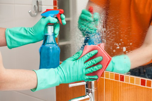 Bathroom move out cleaning in Bow focusing on limescale and fixtures