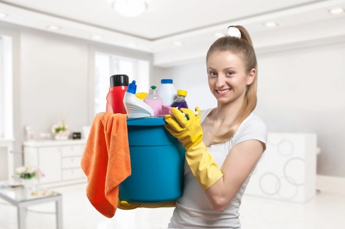 Technician cleaning upholstery stains in a Bow property
